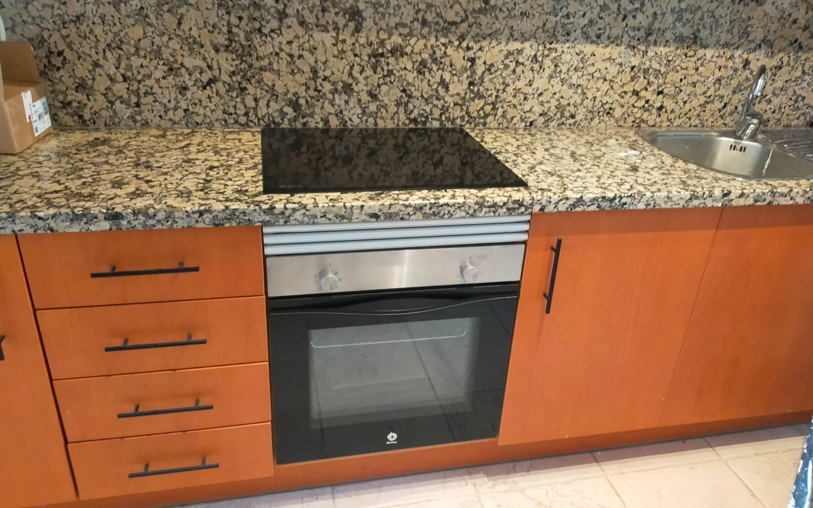 Instalación profesional de horno y placa de cocina
